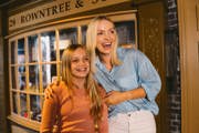 A Family Pose Infront Of A Replica Of Rowntree'S Original York Shopfront