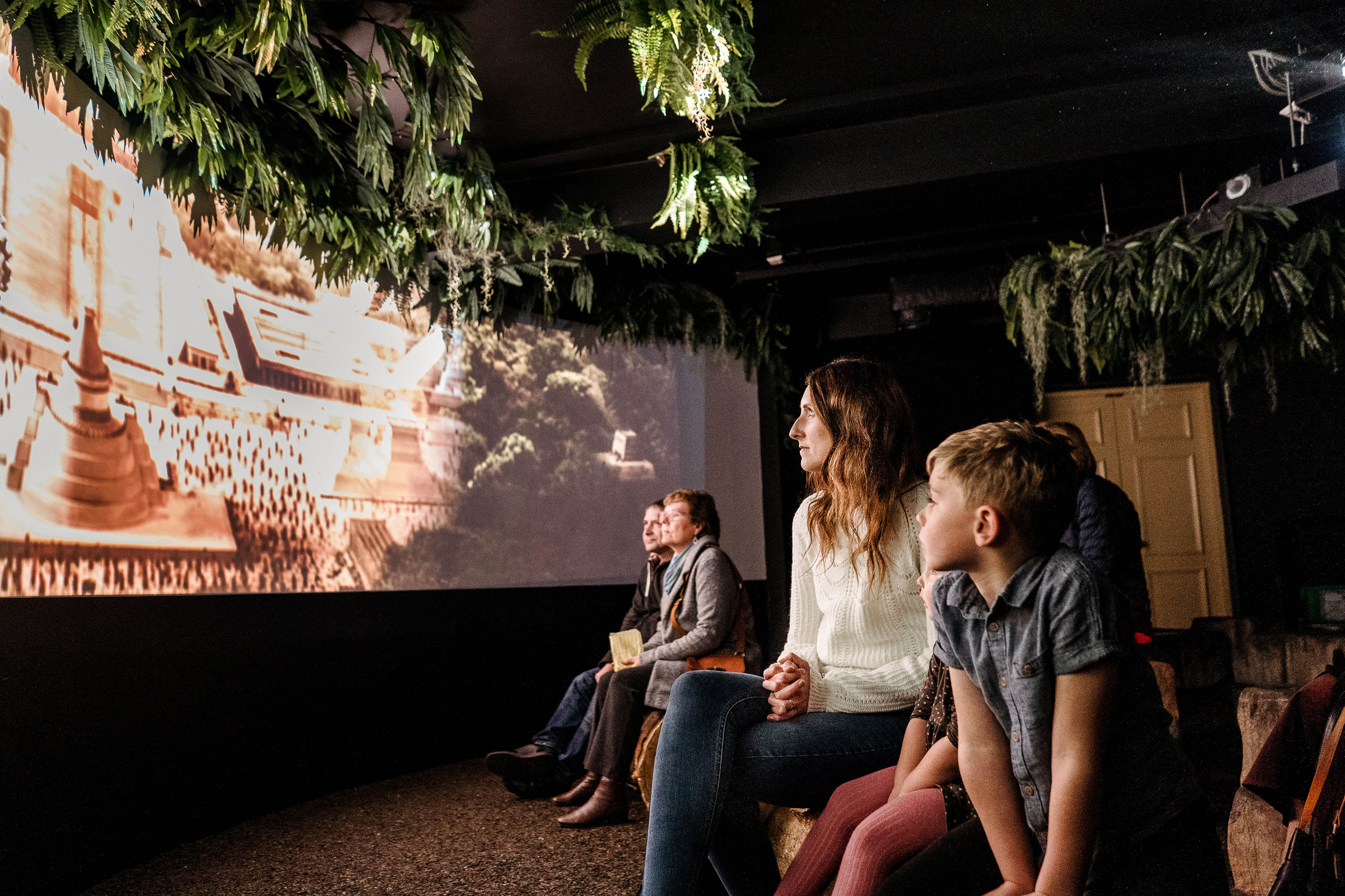 A Family Learns About Chocolate'S Origins In The Aztec Room